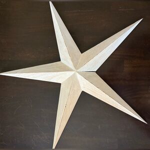 White wooden star wall decor